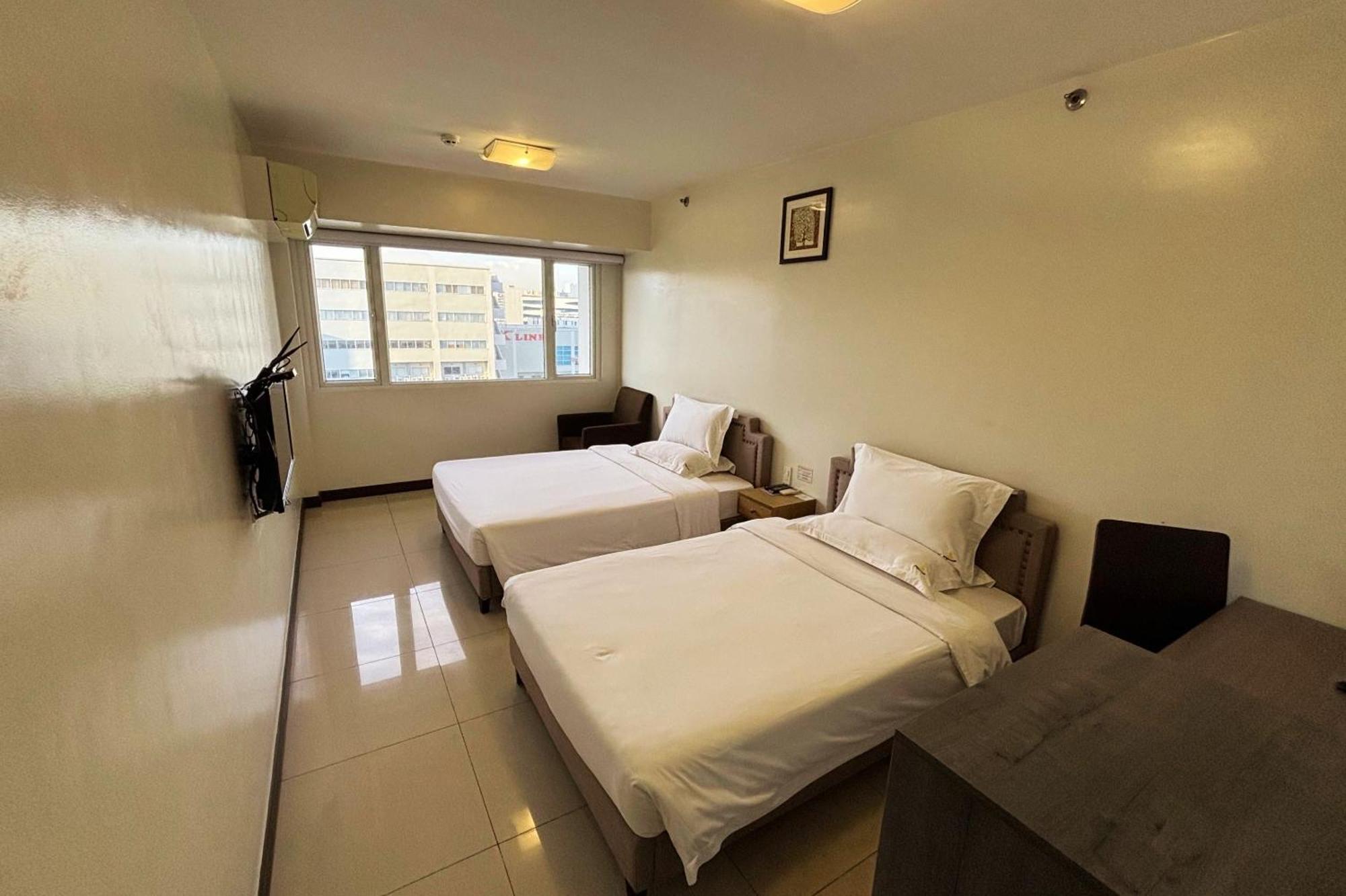 Extremeli Suites Manila Powered By Cocotel Esterno foto